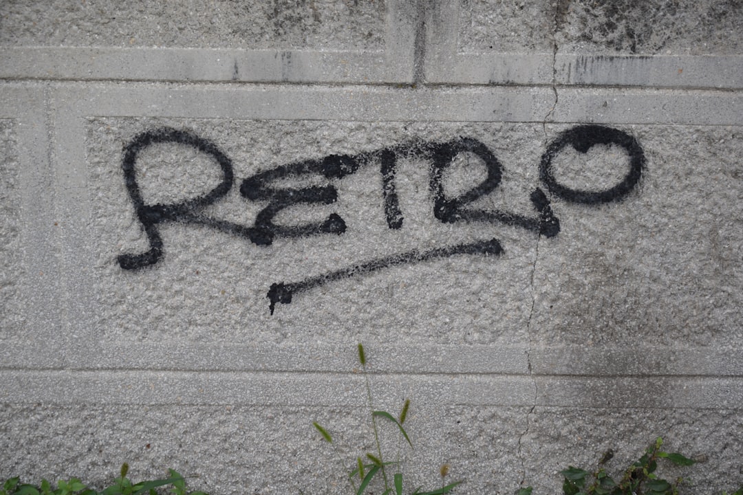 graffiti-spelling-the-word-retro-on-a-wall-bjnuy6ujswm